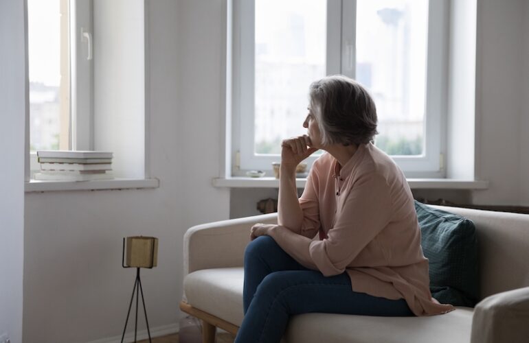 A woman shows symptoms of depression.