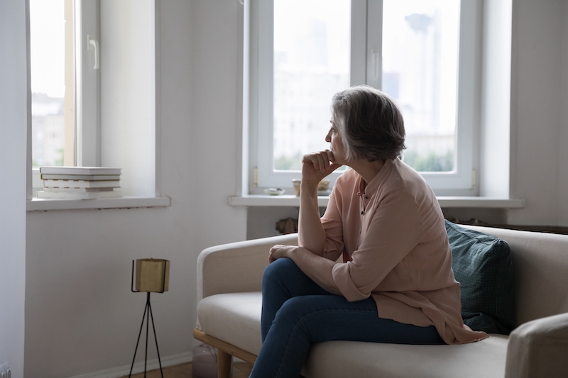 A woman shows symptoms of depression.