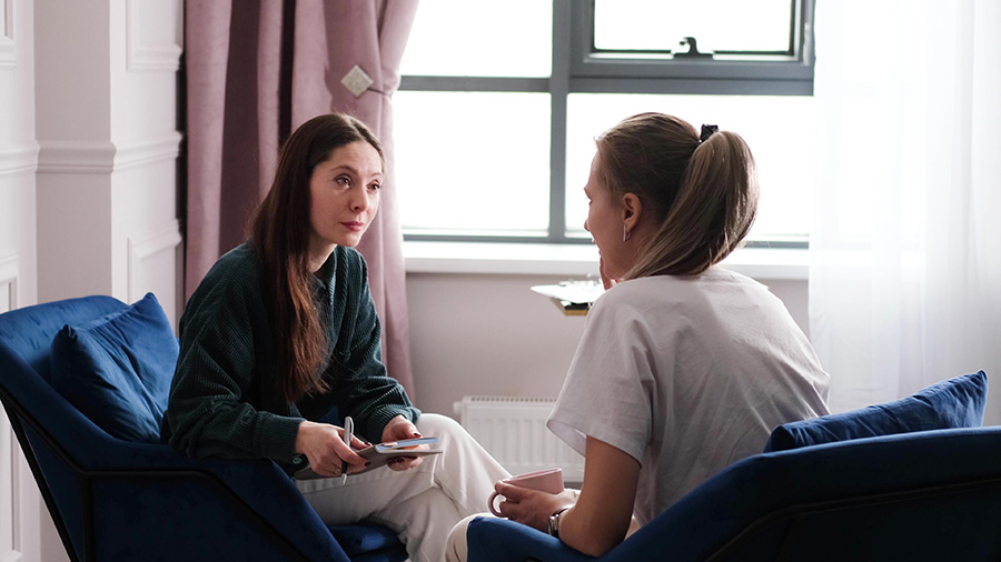 A woman participates in trauma therapy.