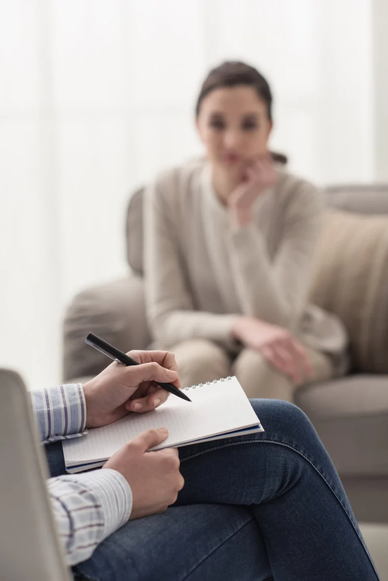 A woman attends therapy for OCD treatment.