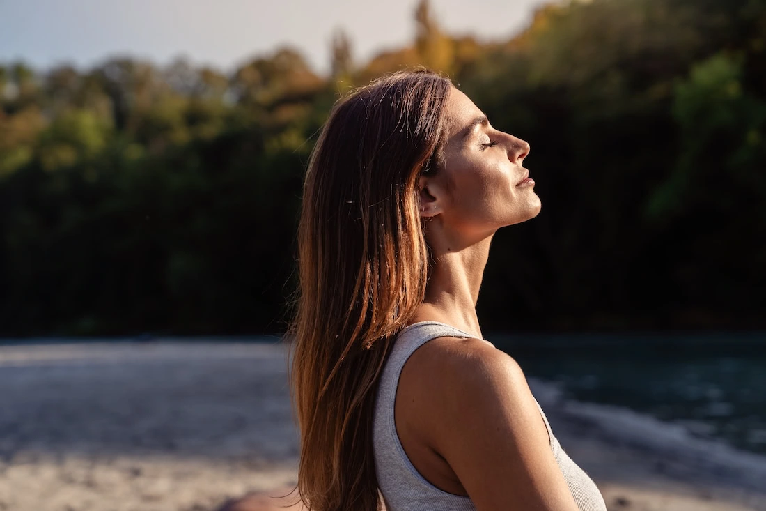 A woman practices self-compassion.
