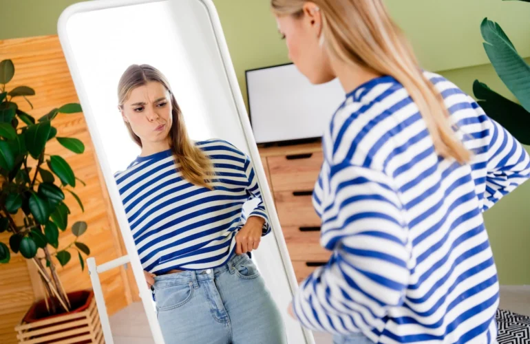 A woman struggles with body image issues.