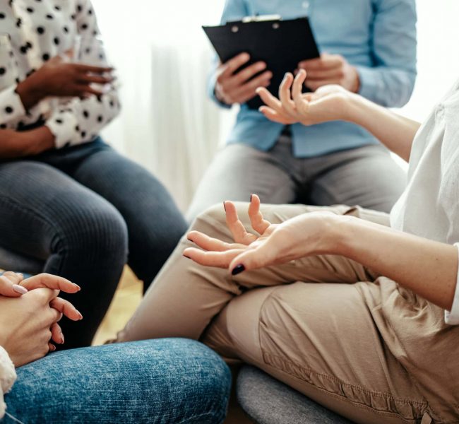 Unrecognizable,Vulnerable,Woman,Participates,In,Group,Therapy,Session.,Unrecognizable,Caucasian
