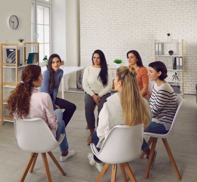 Young,Women,Telling,Their,Stories,In,Therapy,Session,Or,Support