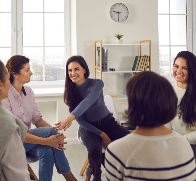 Happy,Positive,Smiling,Female,Coach,,Therapist,Or,Business,Team,Manager